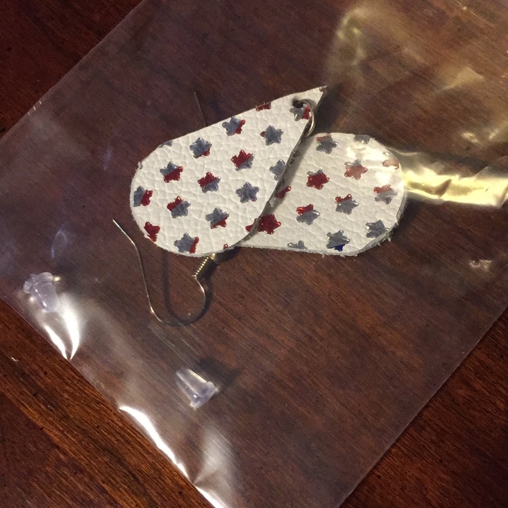 Leather star earrings